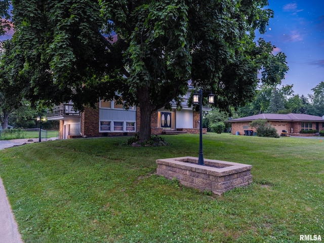 2810 Deveron Cir, Pekin, IL 61554 - view of front facade featuring a front yard and brick siding