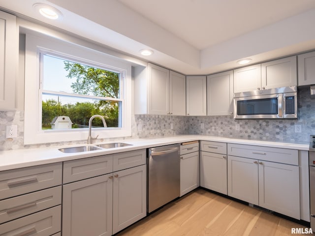 2810 Deveron Cir, Pekin, IL 61554 - kitchen featuring appliances with stainless steel finishes, gray cabinetry, light countertops, and recessed lighting