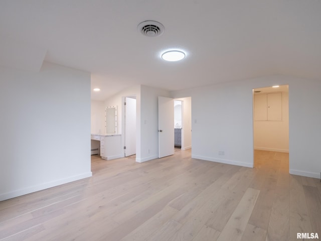 2810 Deveron Cir, Pekin, IL 61554 - empty room featuring light wood-type flooring, a baseboard radiator, and recessed lighting