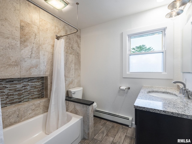 2810 Deveron Cir, Pekin, IL 61554 - bathroom featuring a baseboard heating unit, vanity, wood finished floors, and shower / bathtub combination with curtain