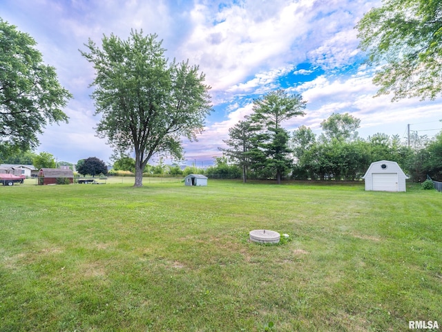 2810 Deveron Cir, Pekin, IL 61554 - view of grassy yard with a shed and a garage