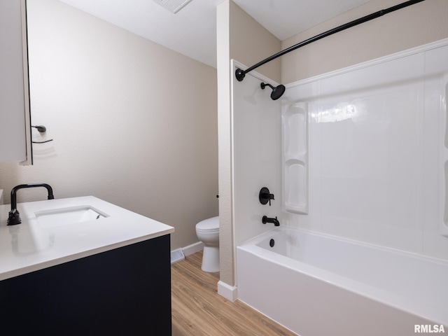 2922 W Larchmont Ln, Peoria, IL 61615 - bathroom with wood finished floors, tub / shower combination, and vanity