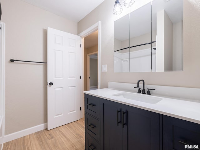2922 W Larchmont Ln, Peoria, IL 61615 - full bath with wood finished floors and vanity