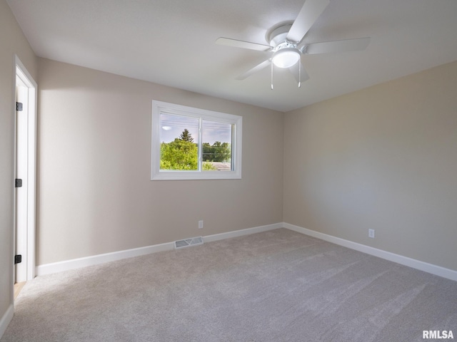 2922 W Larchmont Ln, Peoria, IL 61615 - empty room with carpet flooring and a ceiling fan