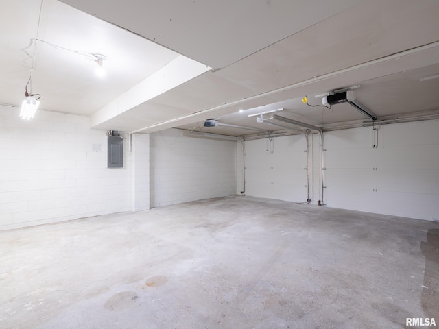2922 W Larchmont Ln, Peoria, IL 61615 - garage featuring a garage door opener and electric panel