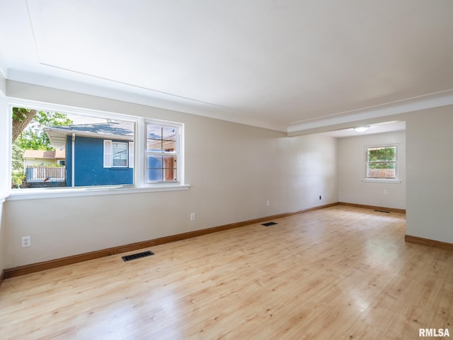 1505 N 9th St, Pekin, IL 61554 - spare room featuring light wood finished floors