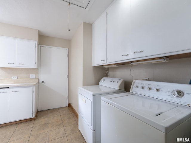 1505 N 9th St, Pekin, IL 61554 - laundry area featuring independent washer and dryer, cabinet space, and light tile patterned floors