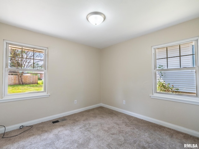 1505 N 9th St, Pekin, IL 61554 - carpeted spare room featuring baseboards