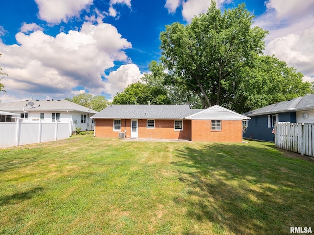 1505 N 9th St, Pekin, IL 61554 - rear view of property with brick siding and a patio