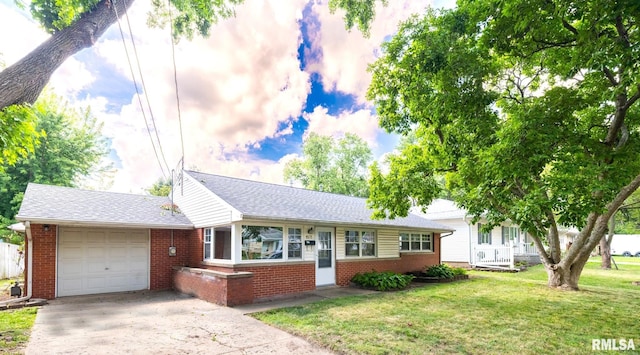 1505 N 9th St, Pekin, IL 61554 - single story home featuring a garage, brick siding, concrete driveway, a front yard, and roof with shingles