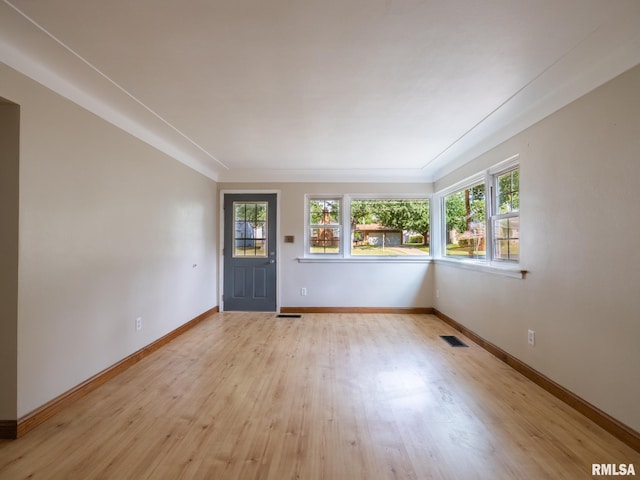 1505 N 9th St, Pekin, IL 61554 - unfurnished room with healthy amount of natural light and light wood finished floors
