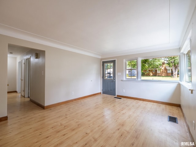 1505 N 9th St, Pekin, IL 61554 - empty room featuring light wood finished floors and baseboards