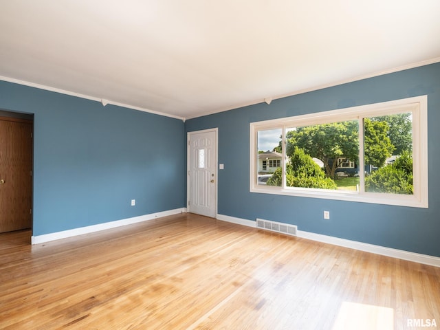 3 Starcevich Ct, Pekin, IL 61554 - empty room featuring crown molding and light wood-type flooring