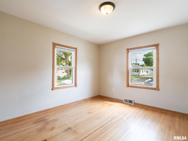 3 Starcevich Ct, Pekin, IL 61554 - empty room featuring light wood-style floors and baseboards