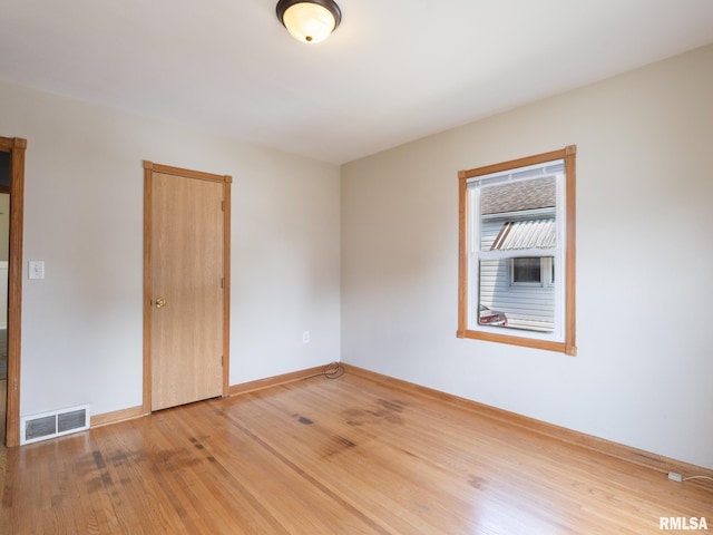 3 Starcevich Ct, Pekin, IL 61554 - unfurnished room with light wood-type flooring and baseboards