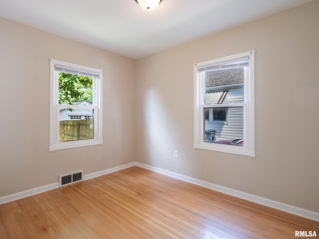 3 Starcevich Ct, Pekin, IL 61554 - empty room featuring light wood-style floors and baseboards