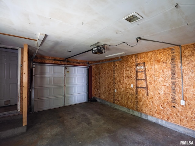 3 Starcevich Ct, Pekin, IL 61554 - garage with a garage door opener and baseboards