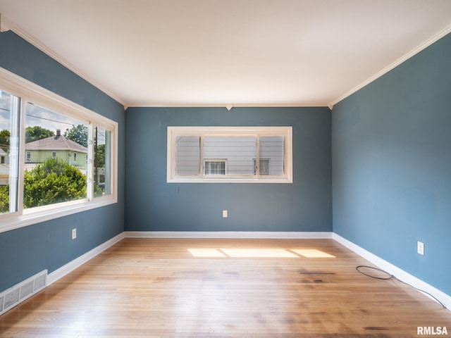 3 Starcevich Ct, Pekin, IL 61554 - empty room with ornamental molding and wood finished floors