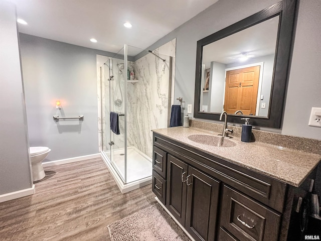 8373 State Route 93rd Rd, Toulon, IL 61483 - full bath featuring vanity, a marble finish shower, wood finished floors, and recessed lighting