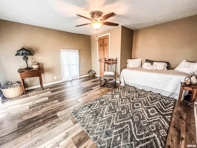 8373 State Route 93rd Rd, Toulon, IL 61483 - bedroom featuring wood finished floors and ceiling fan