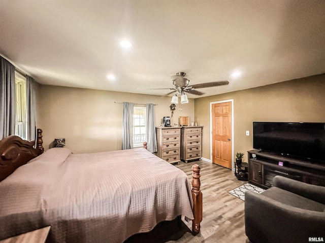 8373 State Route 93rd Rd, Toulon, IL 61483 - bedroom featuring light wood-style floors, ceiling fan, and recessed lighting