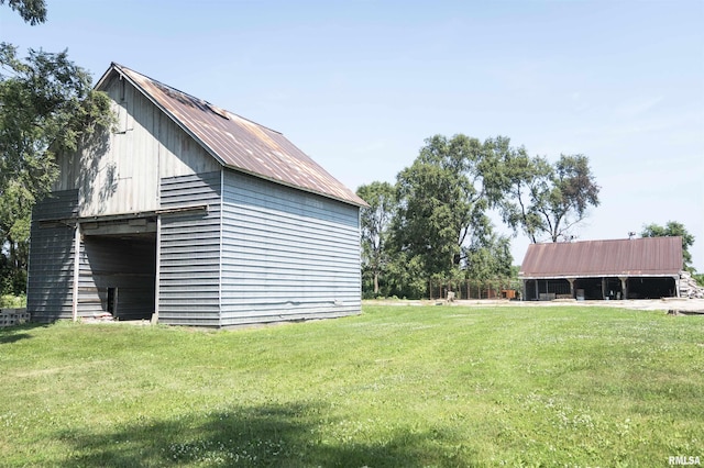 8373 State Route 93rd Rd, Toulon, IL 61483 - view of grassy yard with an outbuilding