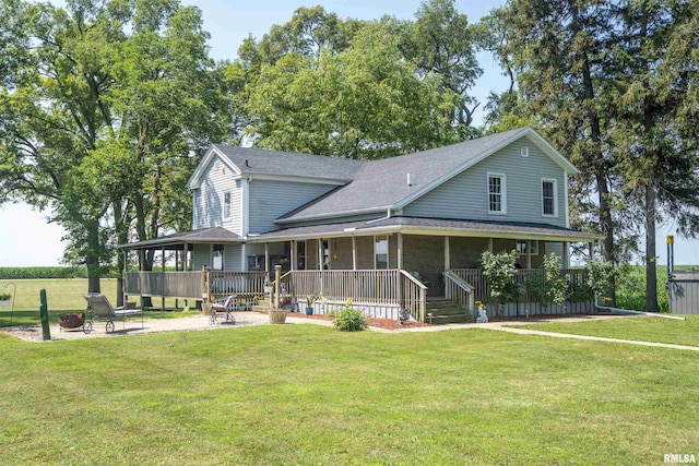 8373 State Route 93rd Rd, Toulon, IL 61483 - farmhouse inspired home with a front lawn, roof with shingles, a porch, and a patio