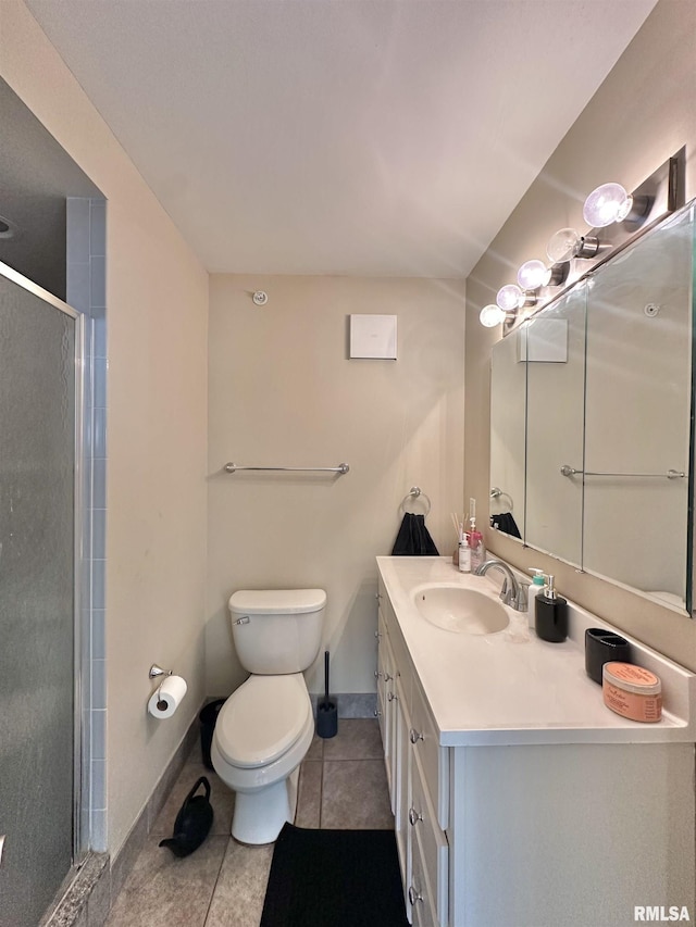 125 SW Jefferson Ave Unit W2A, Peoria, IL 61602 - bathroom with tile patterned flooring, vanity, and a shower stall