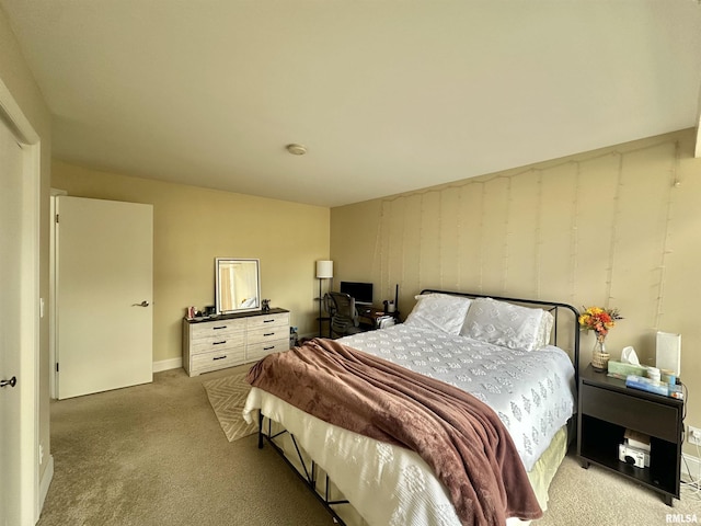 125 SW Jefferson Ave Unit W2A, Peoria, IL 61602 - carpeted bedroom with baseboards