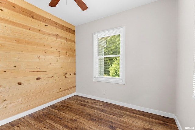 2046 W Wilson Ave, Peoria, IL 61604 - spare room with a ceiling fan and dark wood finished floors
