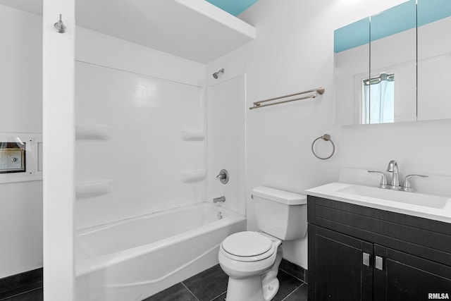 2046 W Wilson Ave, Peoria, IL 61604 - full bath featuring vanity,  shower combination, and tile patterned floors