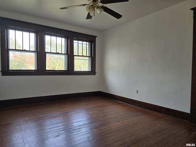1113 S 5th St, Pekin, IL 61554 - spare room with dark wood-type flooring and ceiling fan