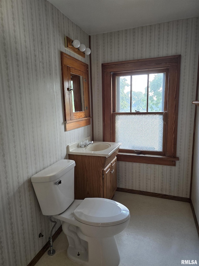 1113 S 5th St, Pekin, IL 61554 - bathroom with wallpapered walls and vanity