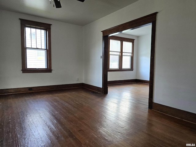 1113 S 5th St, Pekin, IL 61554 - empty room with wood-type flooring, healthy amount of natural light, and ceiling fan