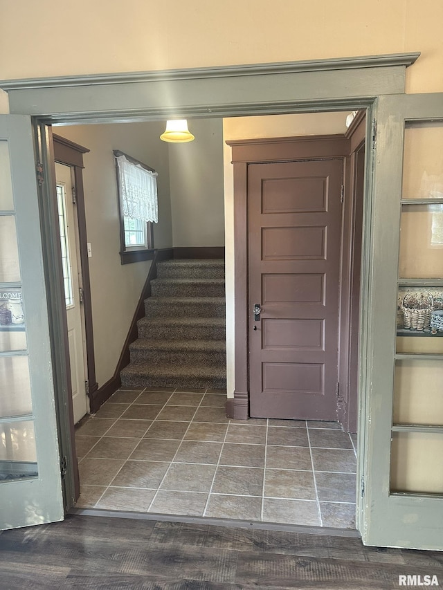 146 W Locust St, Canton, IL 61520 - foyer featuring stairs and tile patterned flooring