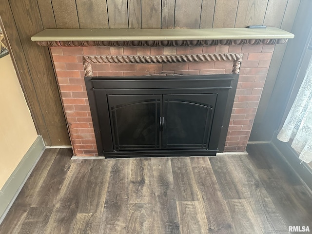 146 W Locust St, Canton, IL 61520 - detailed view of a brick fireplace and wood finished floors