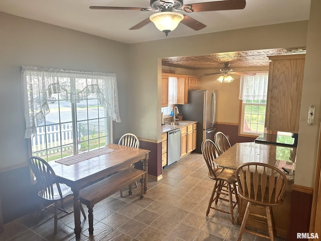 146 W Locust St, Canton, IL 61520 - dining area featuring a ceiling fan