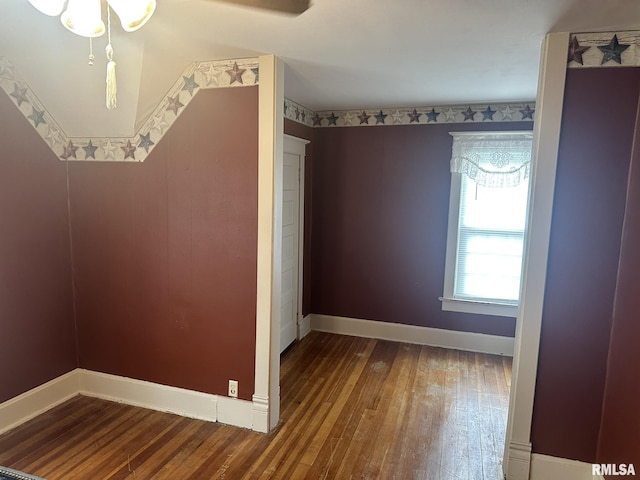 146 W Locust St, Canton, IL 61520 - empty room featuring hardwood / wood-style flooring