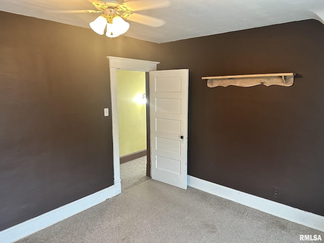 146 W Locust St, Canton, IL 61520 - empty room featuring ceiling fan and baseboards