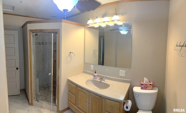 146 W Locust St, Canton, IL 61520 - bathroom featuring vanity, a stall shower, tile patterned flooring, and ceiling fan