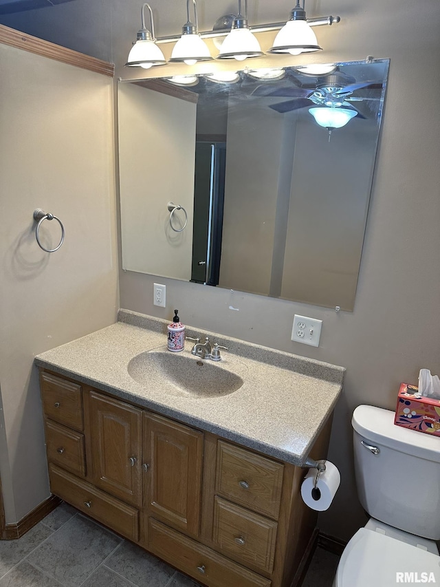 146 W Locust St, Canton, IL 61520 - bathroom featuring vanity and toilet