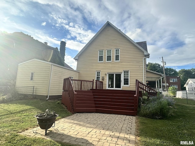 146 W Locust St, Canton, IL 61520 - back of property featuring a patio area, a fire pit, a wooden deck, and stairway