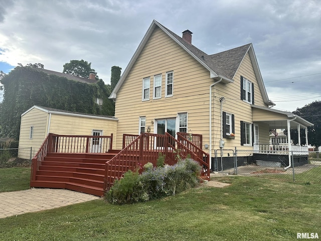 146 W Locust St, Canton, IL 61520 - rear view of property with a chimney, stairway, covered porch, a gate, and a deck