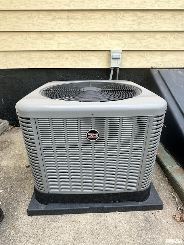 146 W Locust St, Canton, IL 61520 - exterior view of a central air condition unit