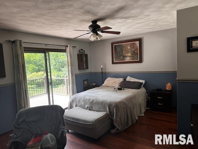1415 E Sycamore St, Canton, IL 61520 - bedroom featuring access to exterior, wood finished floors, a textured ceiling, and a ceiling fan