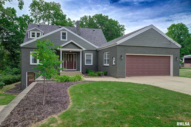 2129 Fondulac Dr, East Peoria, IL 61611 - view of front of property with brick siding, a garage, a front lawn, a chimney, and driveway