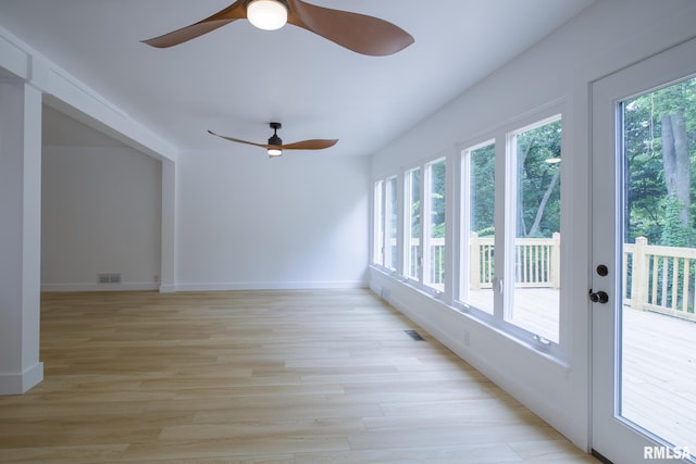 2129 Fondulac Dr, East Peoria, IL 61611 - unfurnished sunroom featuring french doors and wood finished floors