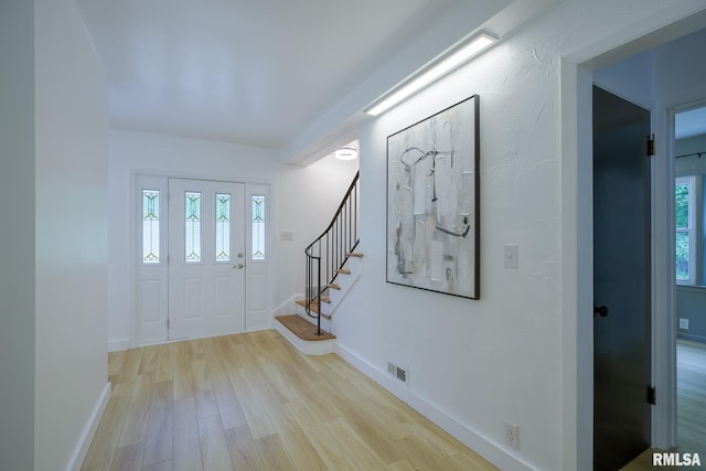 2129 Fondulac Dr, East Peoria, IL 61611 - entryway with wood finished floors and stairway