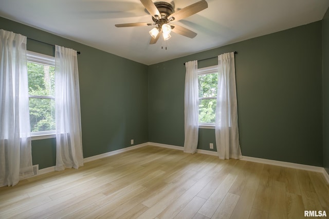2129 Fondulac Dr, East Peoria, IL 61611 - unfurnished room with plenty of natural light, light wood-type flooring, and ceiling fan