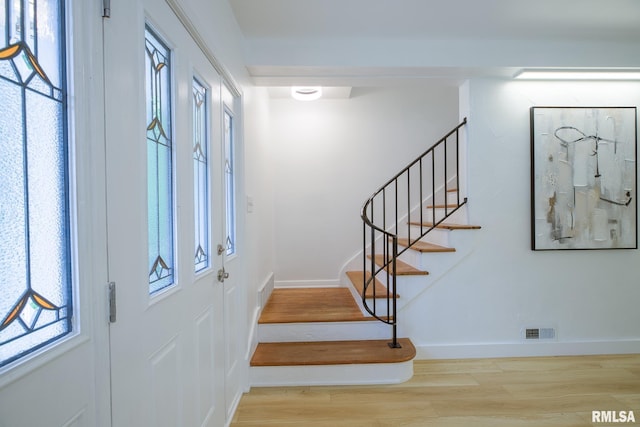 2129 Fondulac Dr, East Peoria, IL 61611 - entryway featuring stairs and wood finished floors